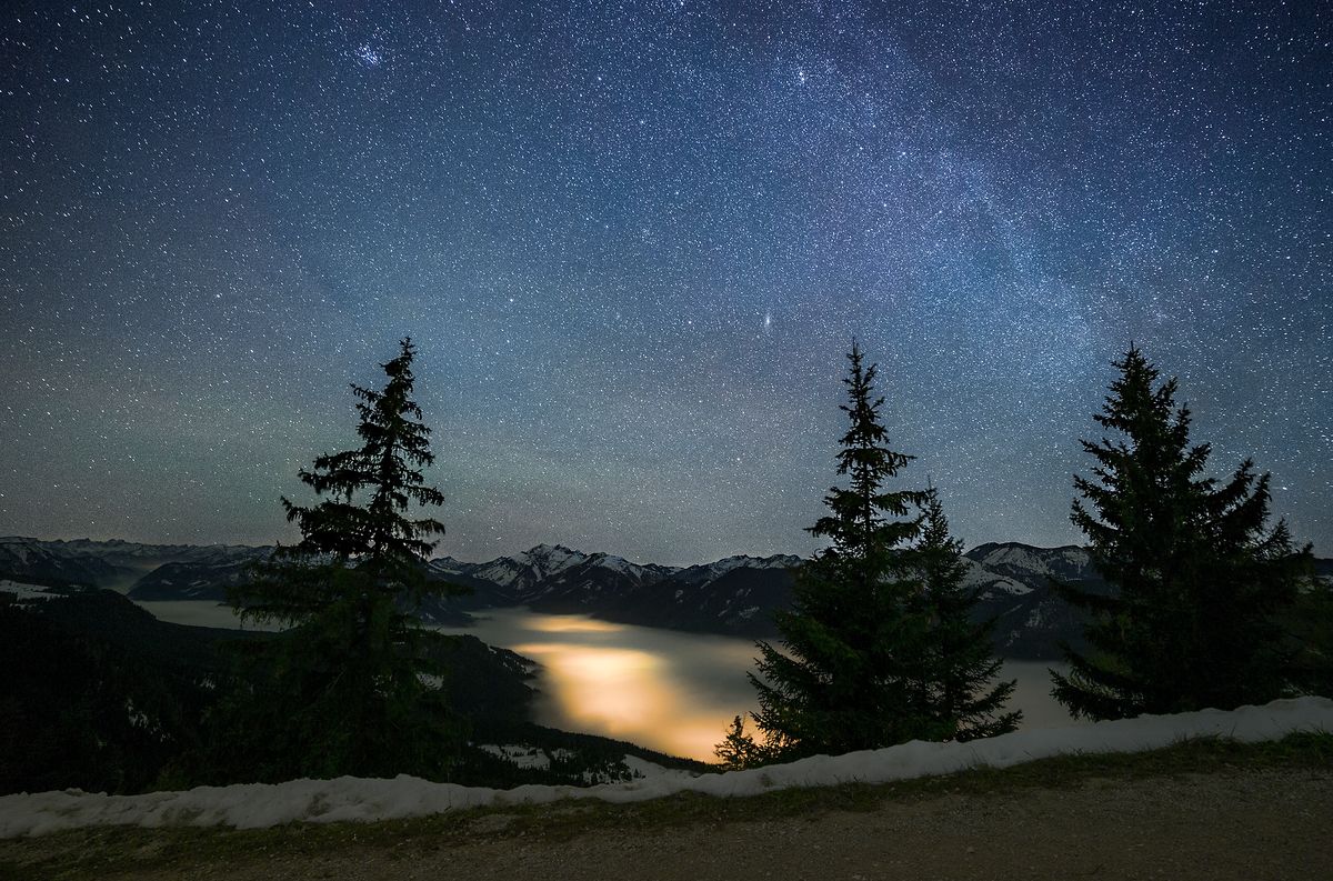 amazing nightsky at a nightwalk to mount "pendling" in tyrol austria. 2 pictures, nightsky at 25 seconds ISO6400, forground 180 seconds IS0 800